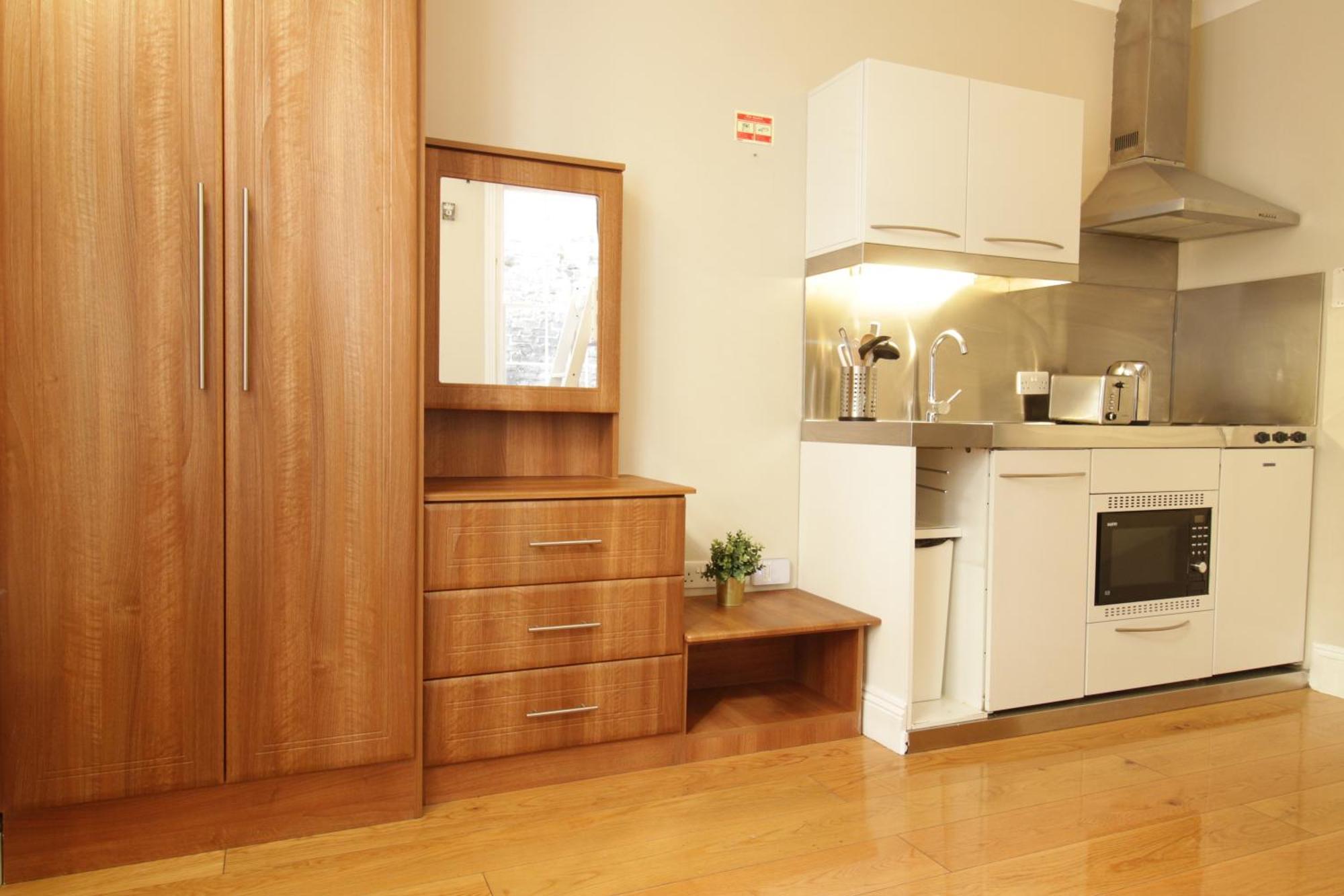 Queen Victoria Apartments Лондон Номер фото